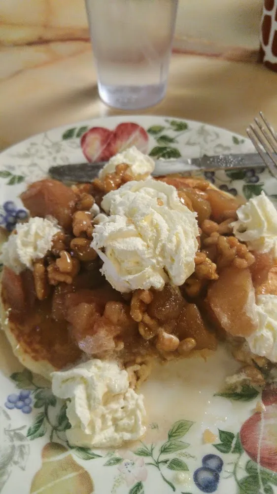 Pancake with Baked Apples Whipped Cream and Walnut Topping
